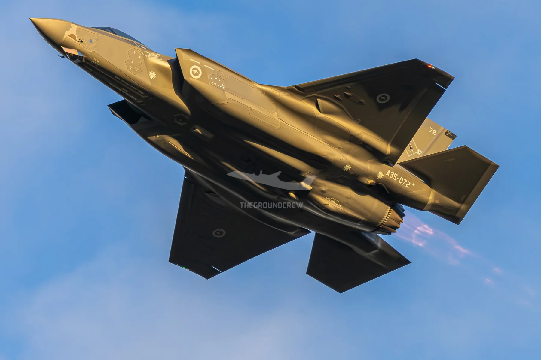 RAAF F-35A flying through golden light
